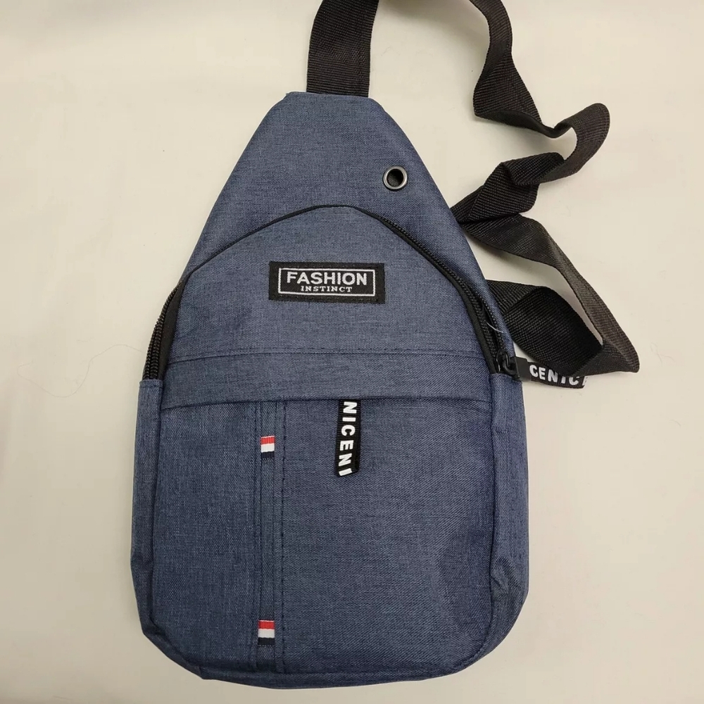 Brand new Fashion Instinct unisex crossbody bag.